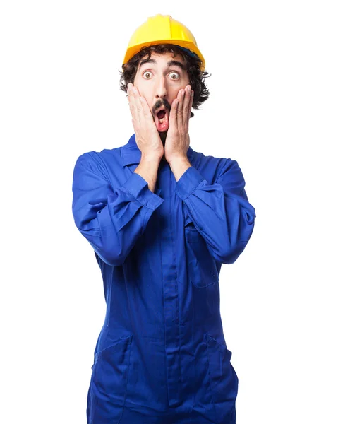 Worried worker man surprised pose — Stock Photo, Image