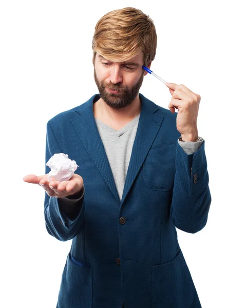 Businessman thinking with paper ball — Stock Photo, Image