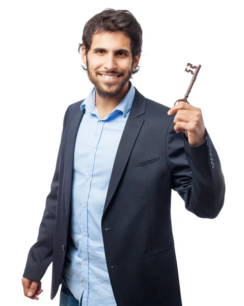 Індійський бізнесмен з ключем — стокове фото