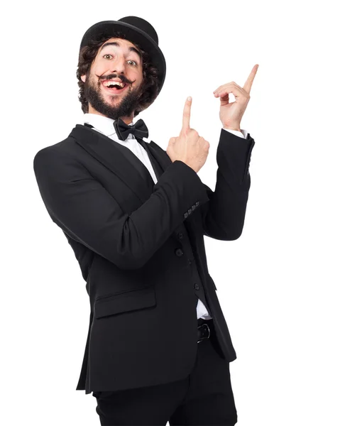 Homem fumando feliz apontando para cima — Fotografia de Stock