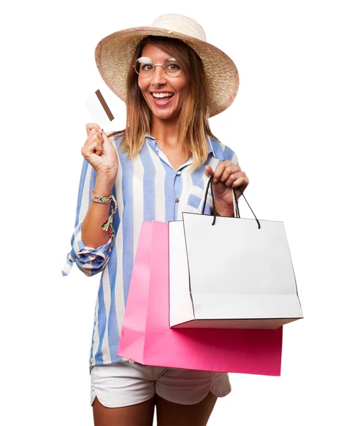 Joyeux jeune femme avec des sacs à provisions — Photo