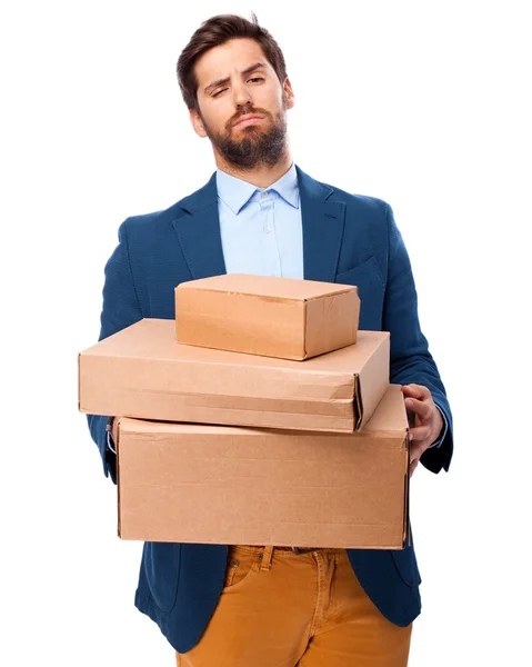 Boring businessman with boxes — Stock Photo, Image