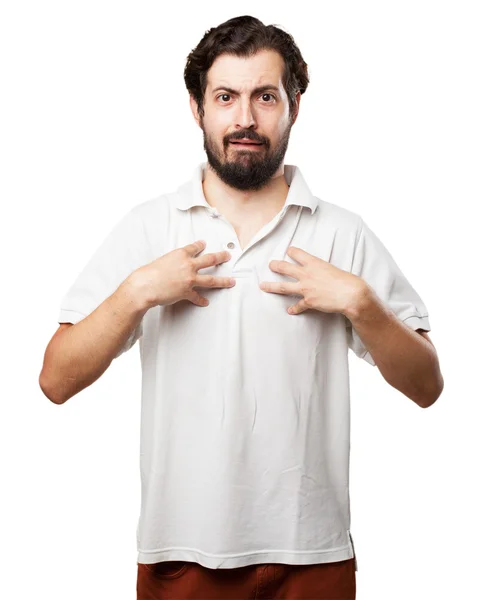 Surprised young man confused pose — Stock Photo, Image