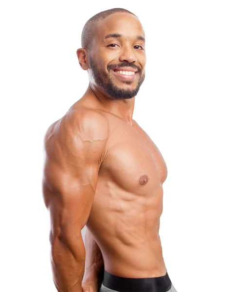 Feliz negro hombre fuerte pose — Foto de Stock