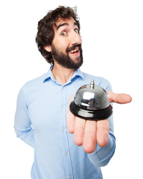 Happy young man with ring bell — Stock Photo, Image