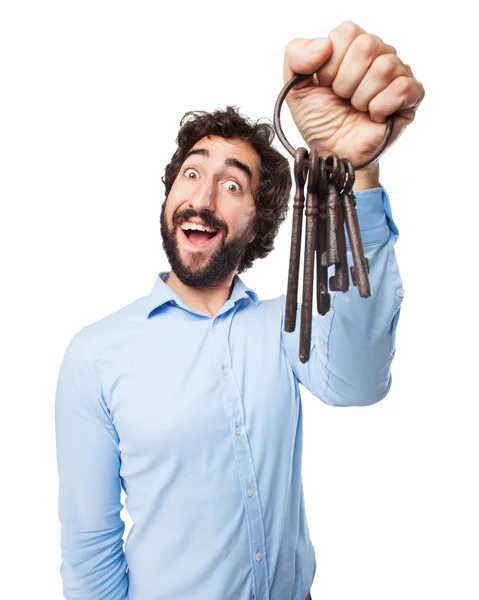 Verrückter junger Mann mit Oldtimer-Schlüssel — Stockfoto