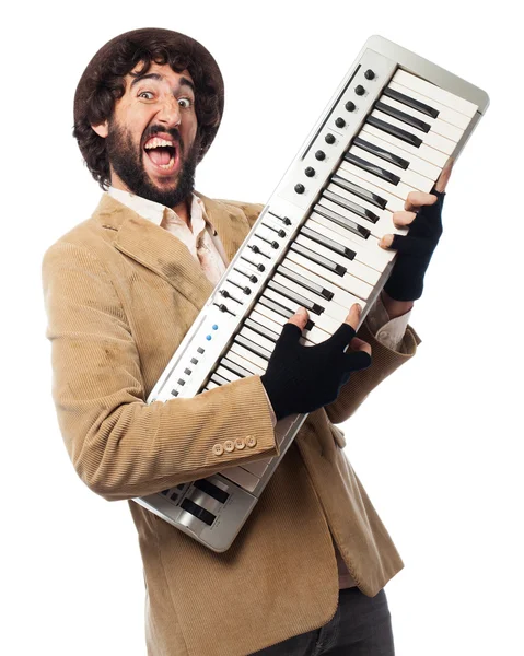 Crazy homeless man with piano — Stock Photo, Image