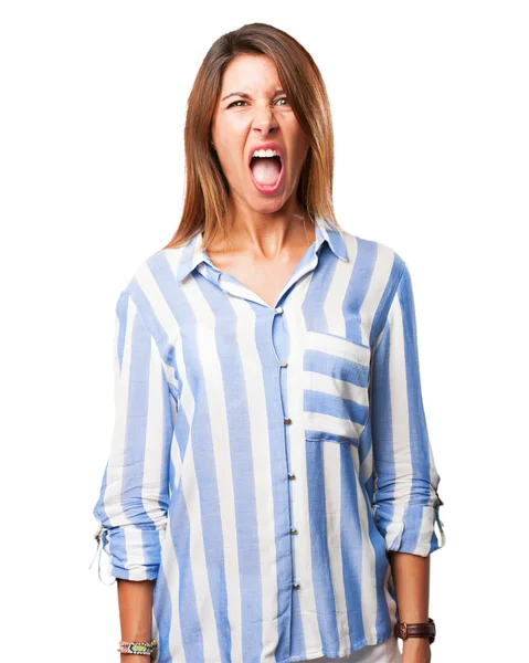 Angry young woman showing tongue — Stock Photo, Image