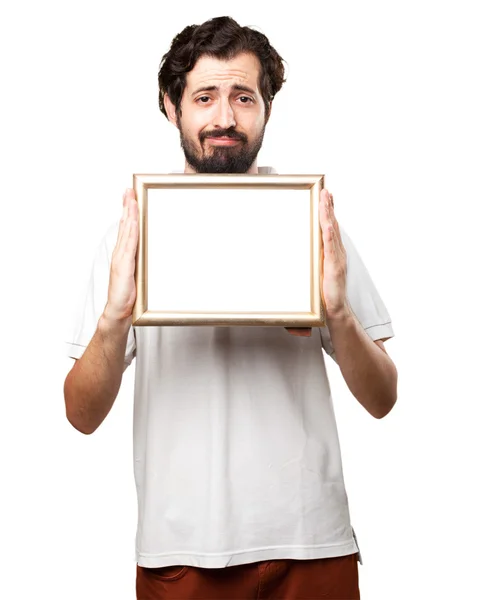 Gek jongeman met retro frame — Stockfoto