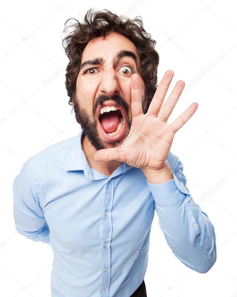 Angry young man shouting Stock Photo by ©kues 83304484