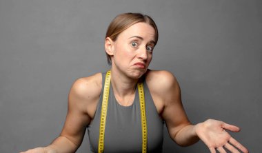 feeling clueless and confused, having no idea, absolutely puzzled with a dumb or foolish look. fitness concept