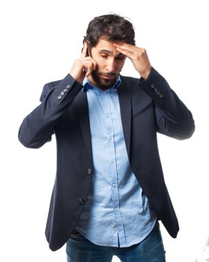 üzgün işadamı ile hareket eden telefon