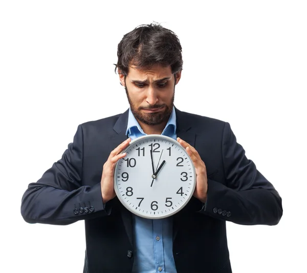 Hombre de negocios preocupado con reloj — Foto de Stock