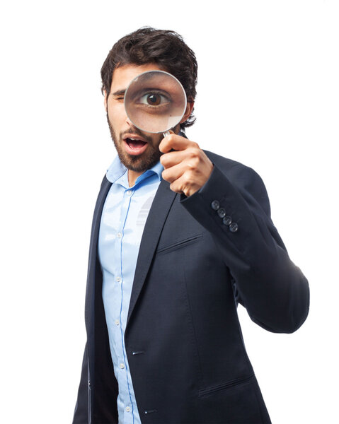 happy businessman with magnifying glass