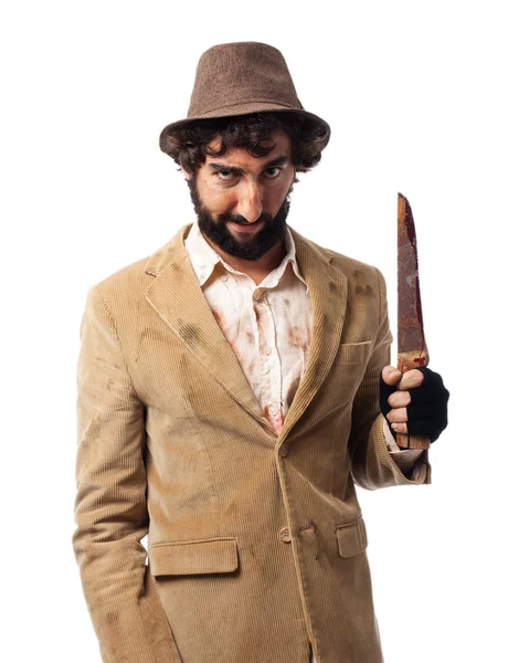 Angry young man with knife — Stock Photo, Image