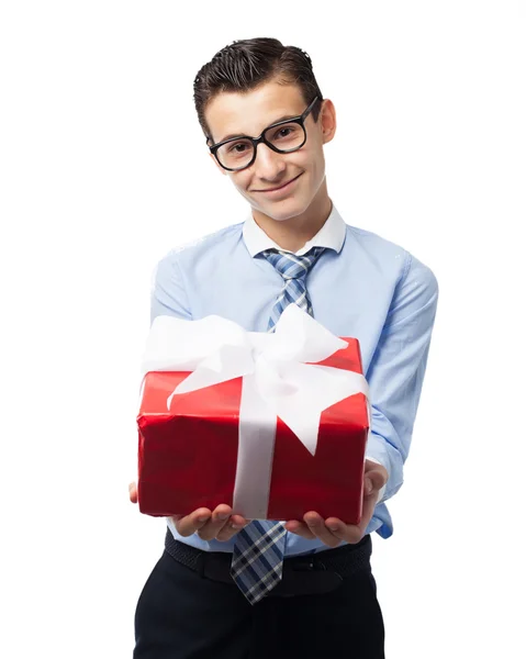 Happy businessman with gift — Stock Photo, Image