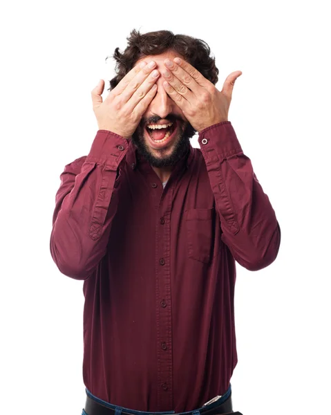 Joven feliz cubriendo los ojos — Foto de Stock