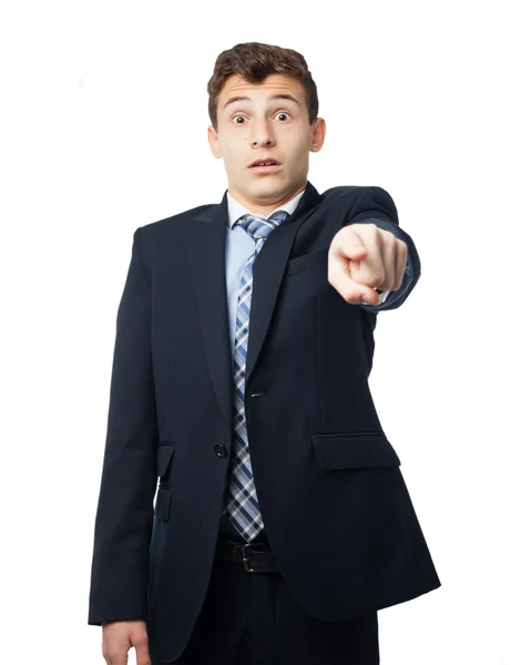 Surprised businessman pointing front — Stock Photo, Image