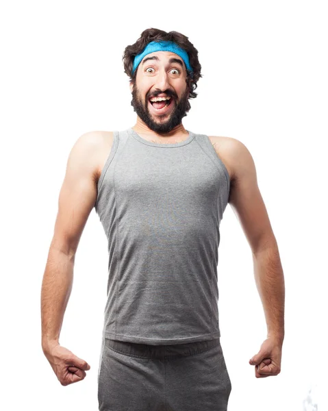 Happy sport man stark pose — Stockfoto