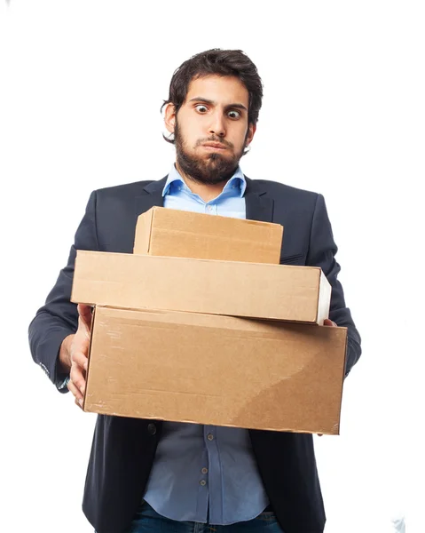 Hombre de negocios feliz con cajas —  Fotos de Stock