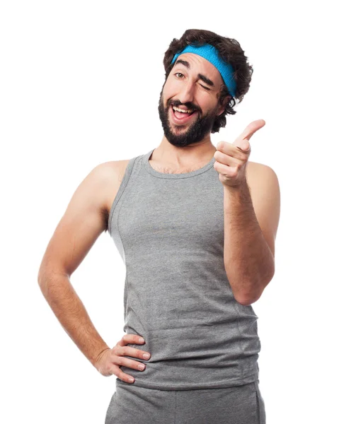 Happy sport man pointing front — Stock Photo, Image