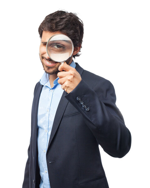happy businessman with magnifying glass