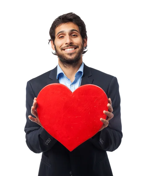 Happy businessman with heart symbol — Stock Photo, Image