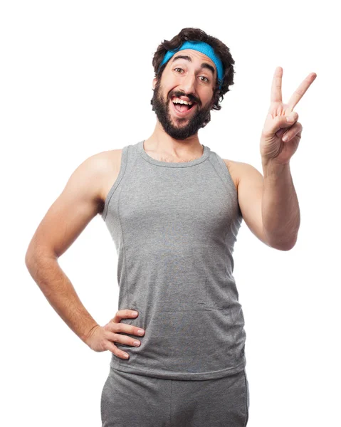 Angry sport man with victory sign — Stock Photo, Image