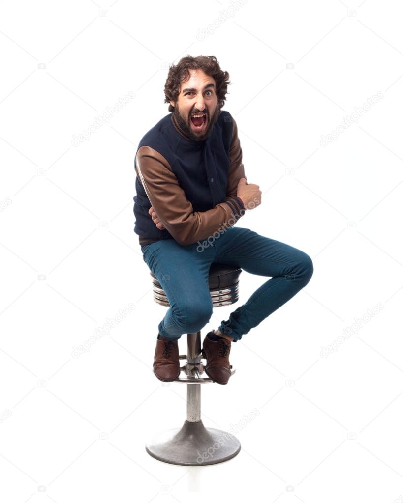 angry young man with bar stool