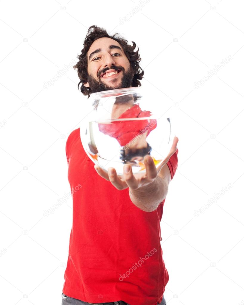 happy young man with fishbowl