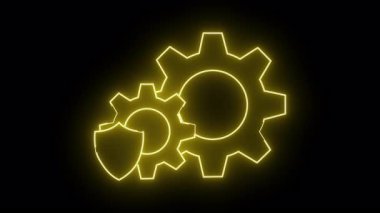 İki dişlinin parlayan sarı çizgisi siyah bir arkaplanda bir kalkanla kenetlenmiş.