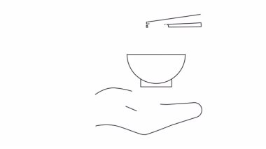 Ellerin yemek çubuklarıyla erişte kasesini tutuyor.