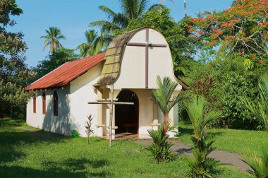 Exterior of the small catholic church in the town of Tortuguero, Costa Rica. clipart