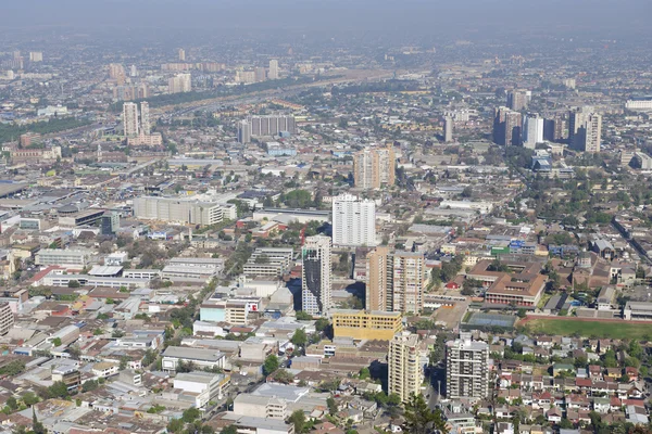 Aerial view of the Santiago city with the blue smog from the San Cristobal Hill, Santiago, Chile. — Stock Photo, Image