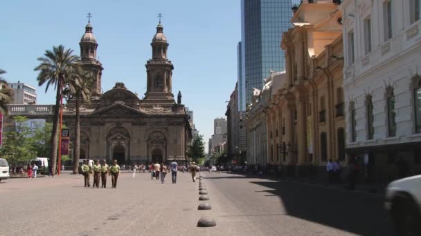 People walk by Plaza de Armas in Santiago, Chile. — Stock Video