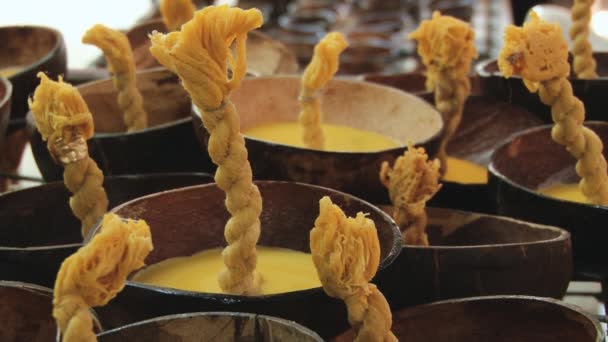 Coconut krathongs (floating candles) for sale at a shop in Tak, Thailand. — Stock Video