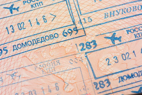 Passport page with the immigration control stamps of the Domodedovo and Vnukovo international airports in Moscow, Russia. — Stock Photo, Image