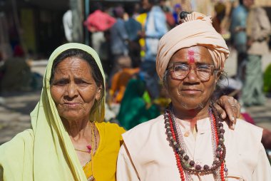 Portrait of two unidentified pilgrims at the street in Orcha, India.