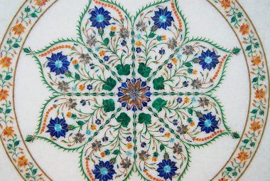 Exterior of the traditional floral marble design, produced by muslim Bharai community in Agra, India.