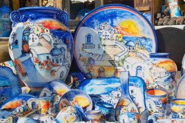 Exterior of the traditional souvenirs from Santorini island in Oia, Greece. clipart
