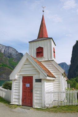 Undredal Stave church exterior in Undredal, Norway. clipart