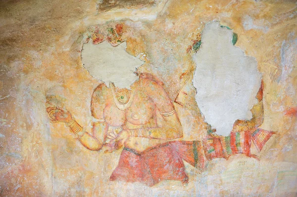 Exterior of the damaged ancient paintings at Sigiriya rock in Sigiriya, Sri Lanka. Stock Image
