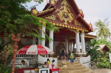 People visit Wat Khunaram temple in Koh Samui, Thailand.