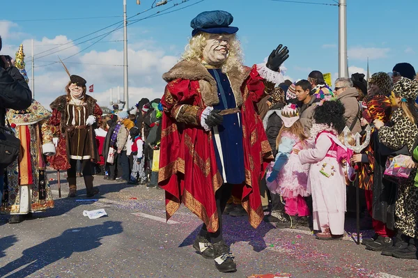 People take part in the parade at Lucerne carnival in Lucerne, Switzerland. — ストック写真