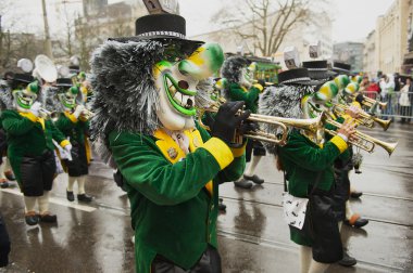 People take part in Basel Carnival in Basel, Switzerland.