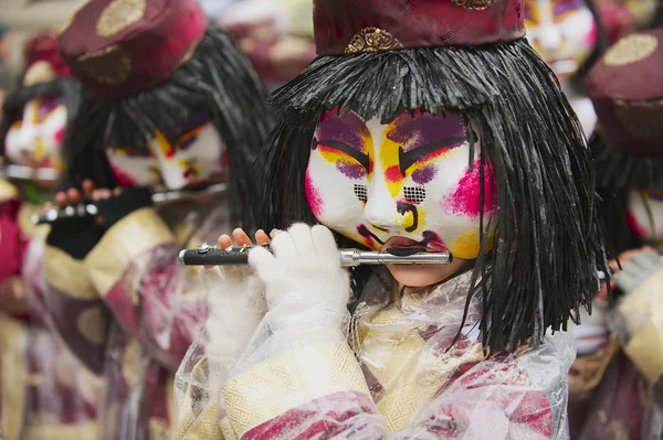 Women play flutes at Basel Carnival in Basel, Switzerland. — Stock Fotó