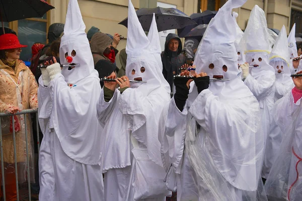 Men play flutes at Basel Carnival in Basel, Switzerland. — Stock Photo, Image