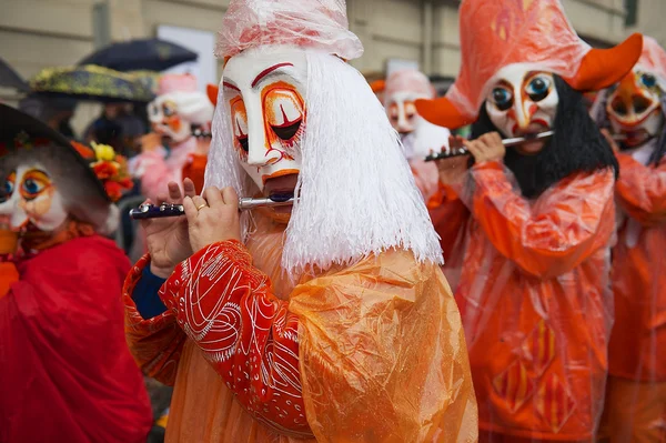 People play flutes at Basel Carnival in Basel, Switzerland. — ストック写真