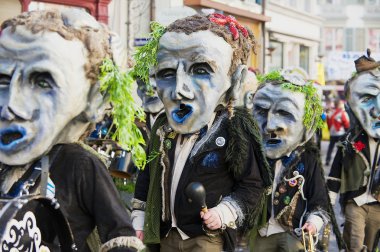 People take part in the parade at Lucerne carnival in Lucerne, Switzerland.