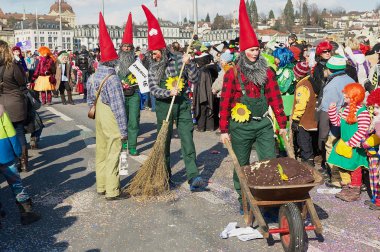 People take part in the parade at Lucerne carnival in Lucerne, Switzerland.